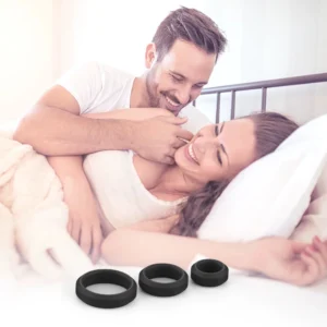 JW-S54 three black cock rings with a couple in a lifestyle scene