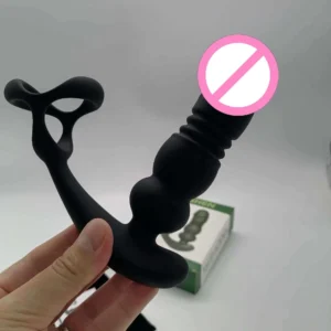 Hand-held view of the JW-S23 prostate massager with packaging in the background